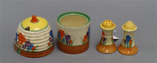 A Clarice Cliff crocus pattern salt, pepper, honey, jam pot